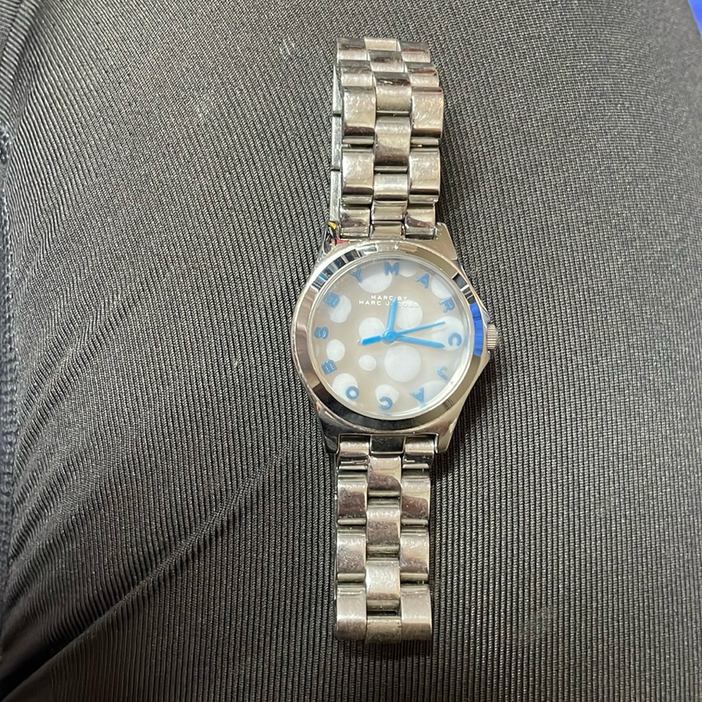 Marc Jacob’s silver watch.